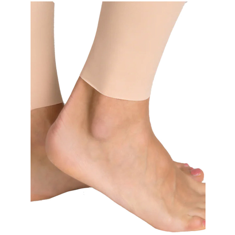 Close-up of Lipoelastic TB Variant nude compression pants showing smooth ankle hem with clean-cut finish.