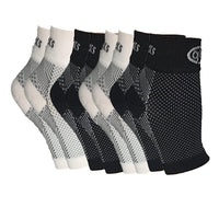 4-pack of GBM mmHg Compression Foot Sleeves with two black and two white sleeve.