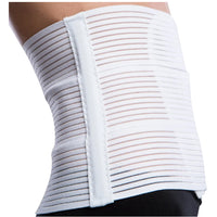 Side view of Lipoelastic KP Special white abdominal binder showing flexible support panels and seamless finish.