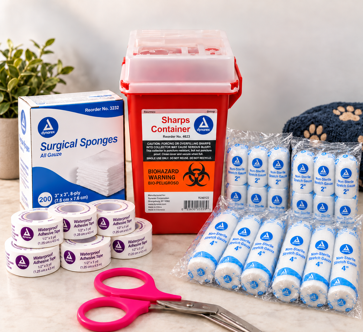 Dynarex veterinary treatment room refill bundle with gauze sponges, four packs of stretch gauze, six waterproof tape rolls, pink bandage shears and red sharps container