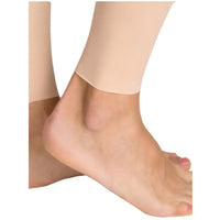 Close-up of Lipoelastic TB Variant nude compression pants showing smooth ankle hem with clean-cut finish.